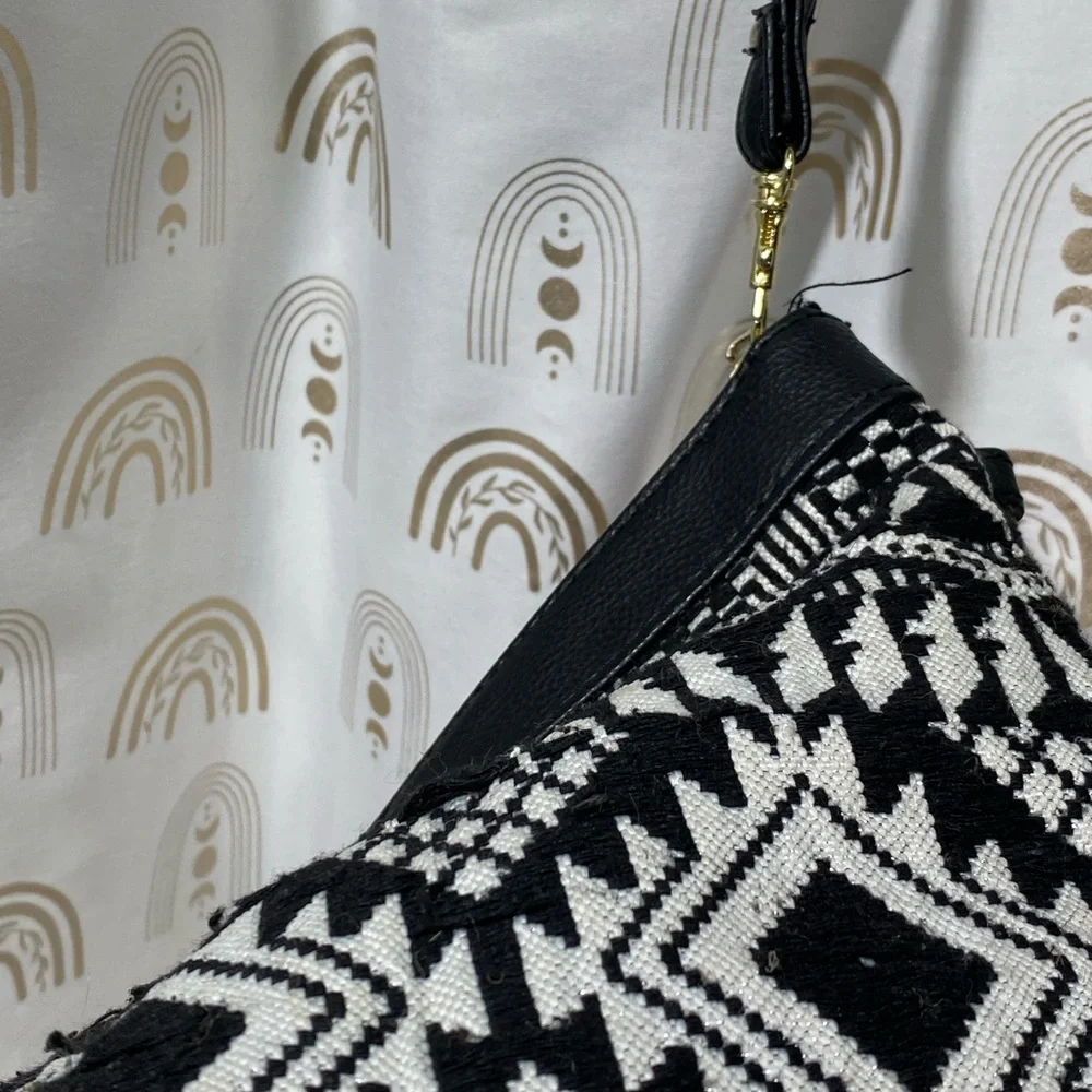 Geometric Black and White Clutch with Pink Tassel